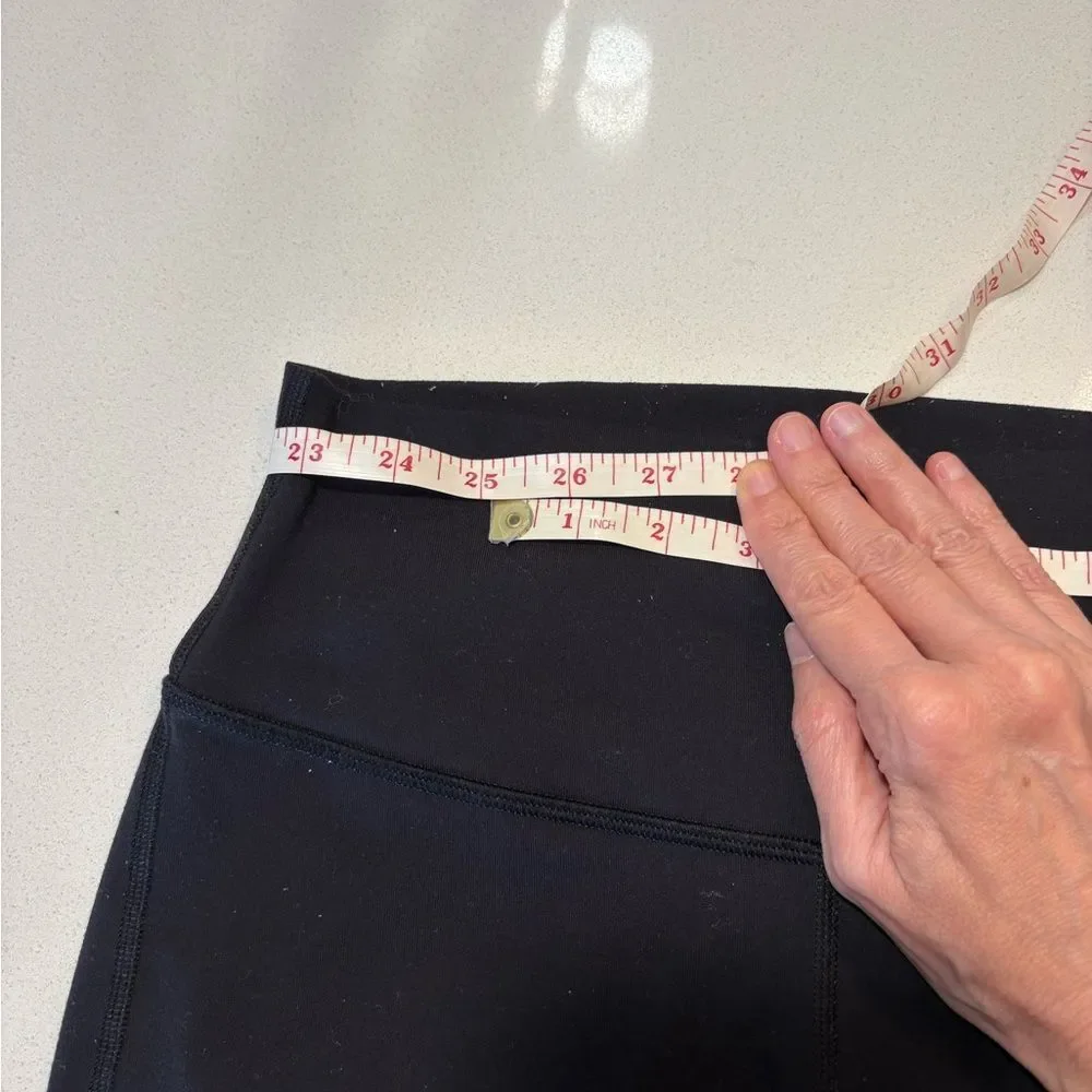 Lululemon black mesh leggings (flawed) size 4. - Picture 9 of 9